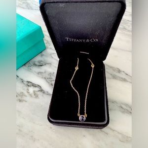 Tiffany purple stone with two diamond. Silver